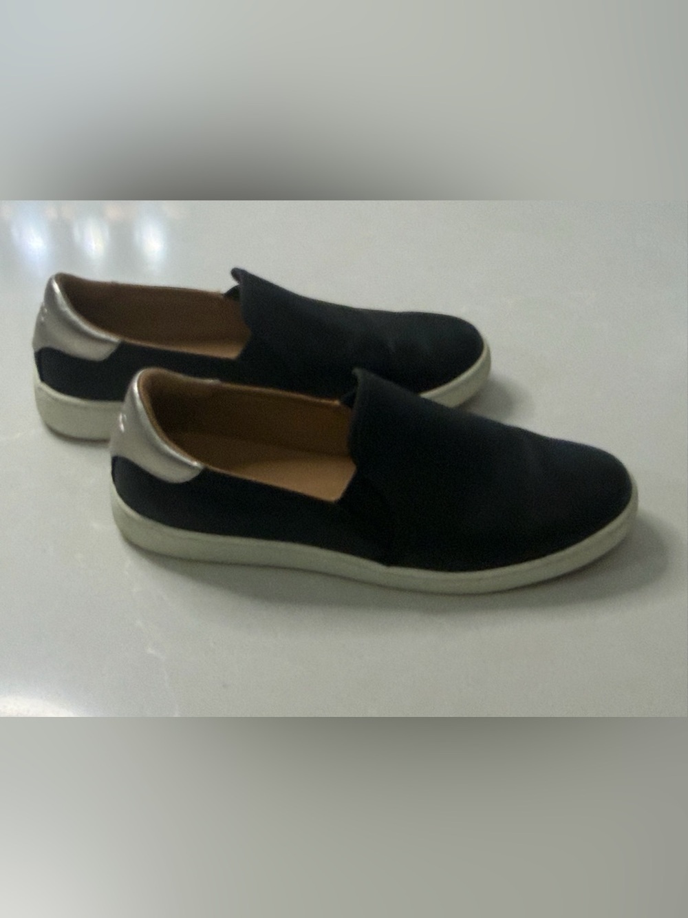UGG Women's Black Slip-On Mules with Silver Heel Accent